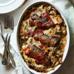 Cooked with sardines in spicy tomato, served on a platter.